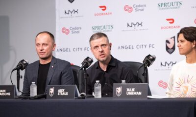 Alexander Straus speaks to the media in his introductory press conference with Mark Parsons and Julie Uhrman.