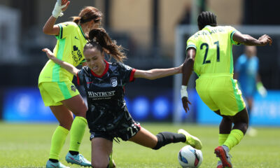 Julia Grosso falls during a ground duel with the Washington Spirit on May 10, 2025.